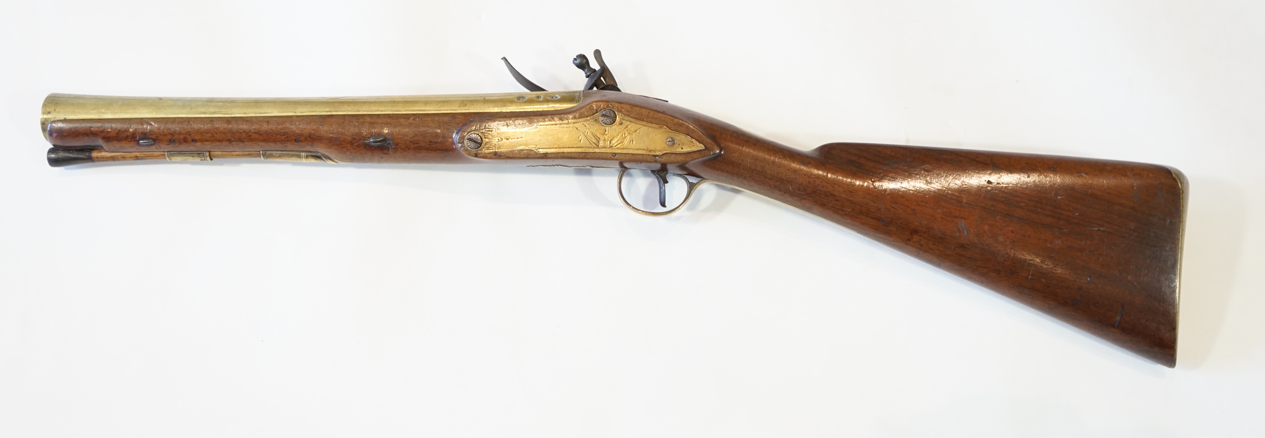An English brass barrel flintlock blunderbuss by H W Mortimer, late 18th century